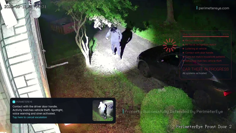 The person running down the driveway away from the car, lit by the searchlight that followed them